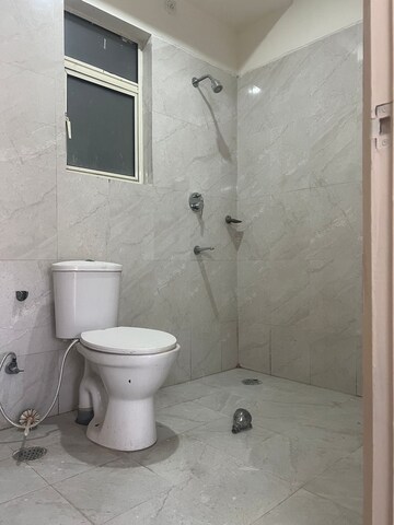 Bathroom in 3 BHK Apartment at Puri Aman Vilas, Sector 89 – for Rent