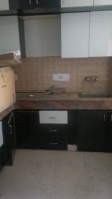 Kitchen in 2 BHK Apartment at MGI Gharaunda, Raj Nagar Extension – for Sale