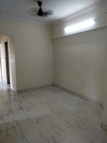 Room in 2 BHK Apartment at Royal Palms Garden View, Goregaon East – for Sale