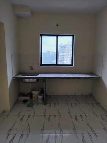 Team Area in 1 BHK Apartment at Royal Palms Garden View, Goregaon East – for Sale