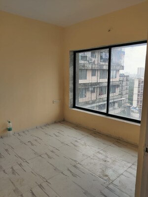 Room in 1 BHK Apartment at Royal Palms Garden View, Goregaon East – for Sale