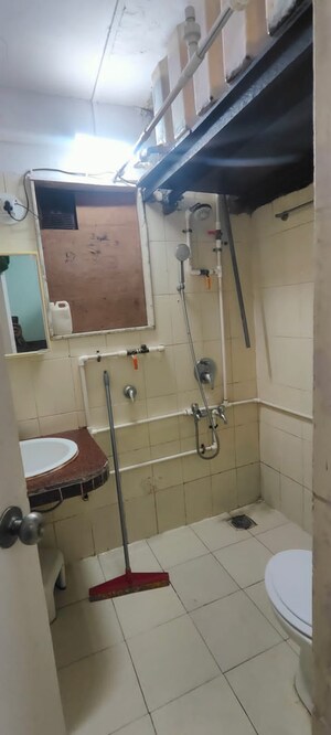 Bathroom in 2 BHK Apartment at Royal Palms Garden View, Goregaon East – for Rent