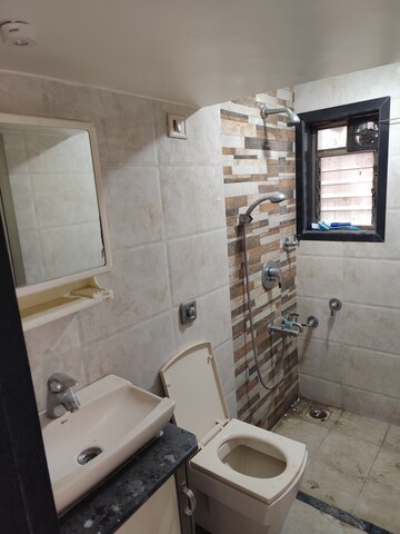 Bathroom in 2.5 BHK Apartment at Runwal Garden City, Balkum Pada – for Rent