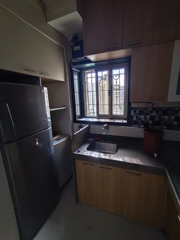 Kitchen in 2.5 BHK Apartment at Runwal Garden City, Balkum Pada – for Rent