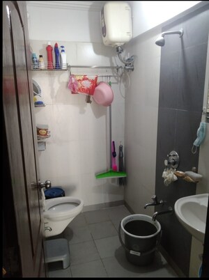 Bathroom in 1 BHK Apartment at Cosmos Orchid, Ghodbunder Road – for Sale