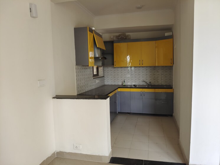 Kitchen, unitech-uniworld-gardens-2 2 Bedroom 973 Sq.Ft. Apartment In Sector 47 Gurgaon 9208498