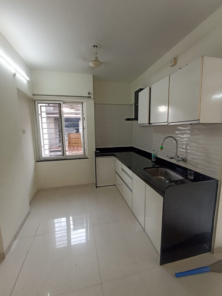 Kitchen, rahul-atul-nagar-chs 2 Bedroom 873 Sq.Ft. Apartment In Warje Pune 9208554