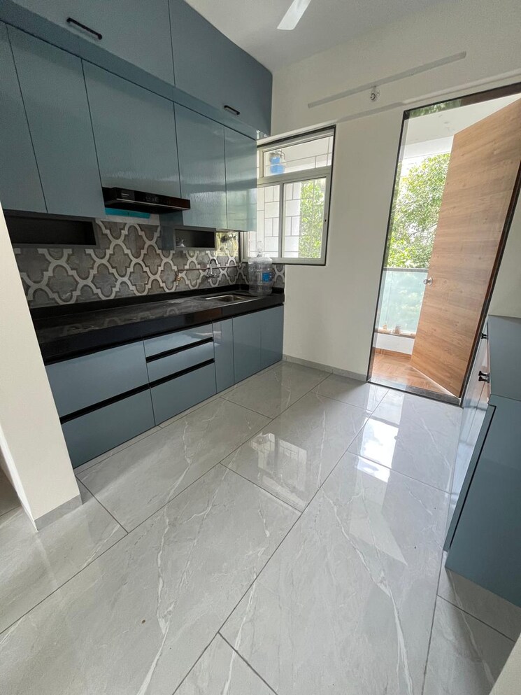 Kitchen, aditya-garden-city 2 Bedroom 622 Sq.Ft. Apartment In Warje Pune 9208578