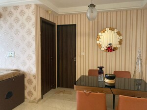 Living Room in 2 BHK Apartment at Transcon Triumph Tower, Andheri West – for Sale