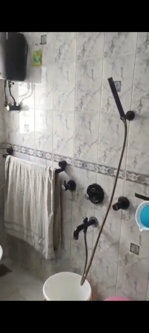 Bathroom in 2 BHK Apartment at Ghatkopar East – for Rent