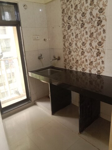 Kitchen in 1 BHK Apartment at KM Narmada Mohan, Naigaon East – for Rent