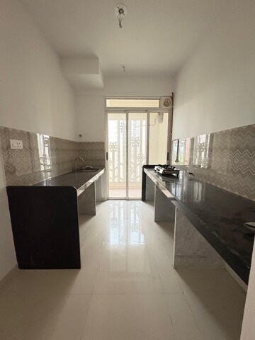 Kitchen in 2 BHK Apartment at Lodha Codename Premier, Dombivli East – for Sale