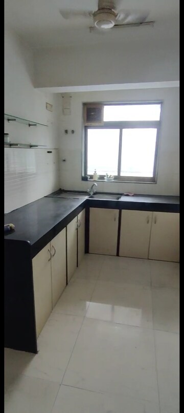 Kitchen in 2 BHK Apartment at Lokhandwala Harmony, Worli – for Rent