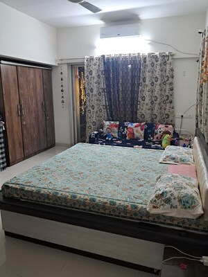 Master Bedroom in 2 BHK Apartment at Mirchandani Palms, Rahatani – for Rent