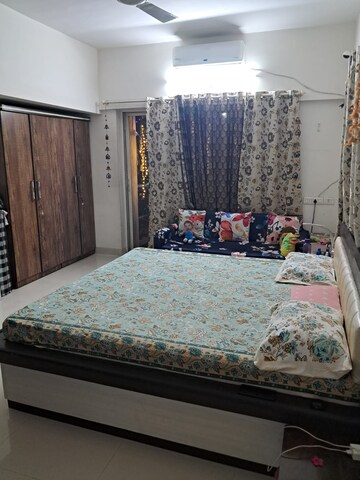 Master Bedroom in 2 BHK Apartment at Mirchandani Palms, Rahatani – for Rent