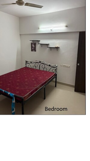 Bedroom in 2 BHK Apartment at Kolte Patil Aleria, Kharadi – for Rent