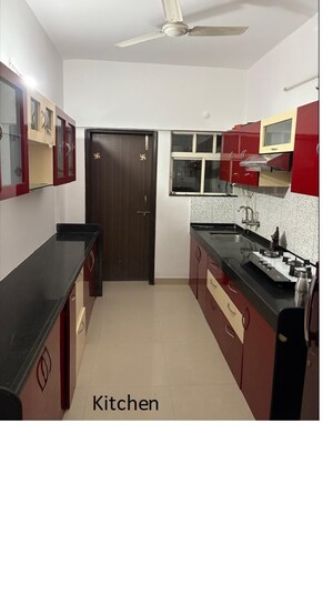Kitchen in 2 BHK Apartment at Kolte Patil Aleria, Kharadi – for Rent