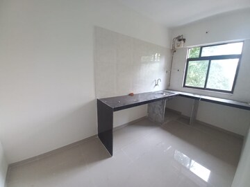 Kitchen in 2 BHK Apartment at New Anand Park CHS, Wagle Industrial Estate – for Rent