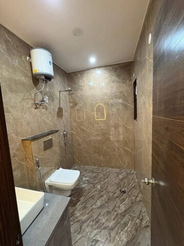 Bathroom in 2 BHK Apartment at Palm Residency Chhatarpur, Chattarpur – for Rent