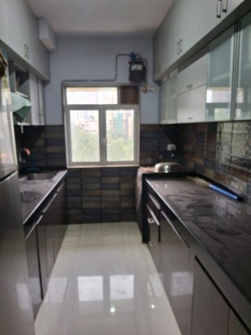 Kitchen in 2 BHK Apartment at Gabadia Heights, Kandivali West – for Rent