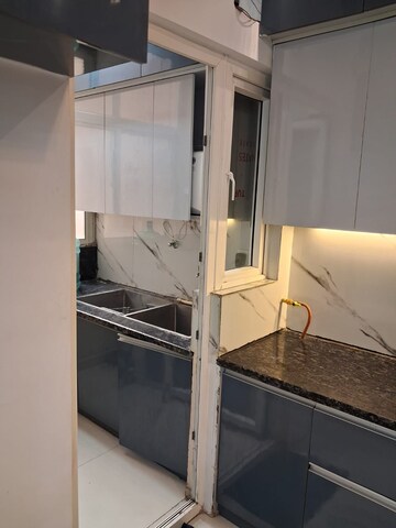 Kitchen in 4 BHK Apartment at DLF Westend Heights, Sector 53 – for Sale