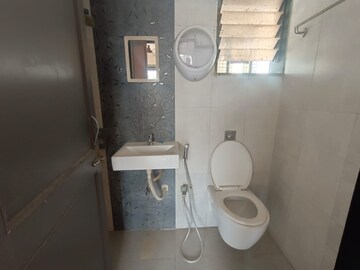 Bathroom in 2 BHK Apartment at Kesar Symphony, Kharghar – for Sale