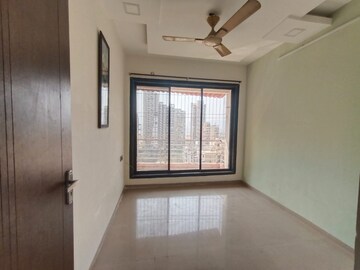 Room in 2 BHK Apartment at Kesar Symphony, Kharghar – for Sale