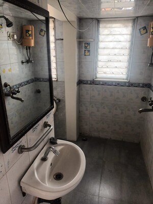 Bathroom in 1 BHK Apartment at Asmita Jyoti CHS, Malad West – for Rent