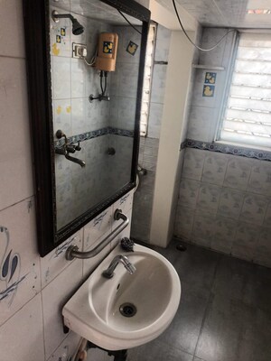 Bathroom in 1 BHK Apartment at Asmita Jyoti CHS, Malad West – for Rent