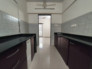 Kitchen in 2 BHK Apartment at Swastik Windsor Heights, Kharghar – for Rent