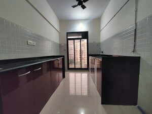 Kitchen in 2 BHK Apartment at Swastik Windsor Heights, Kharghar – for Rent