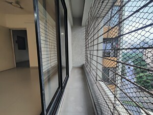 Building Lobby in 2 BHK Apartment at Swastik Windsor Heights, Kharghar – for Rent