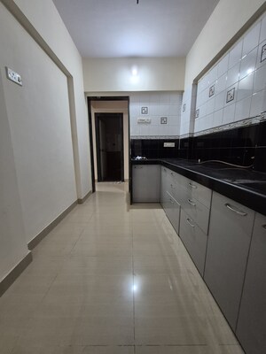 Kitchen in 1 BHK Apartment at Thakur Gayatri Satsang, Kandivali East – for Sale