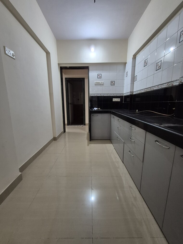Kitchen, thakur-gayatri-satsang 1 Bedroom 595 Sq.Ft. Apartment In Kandivali East Mumbai 9209900