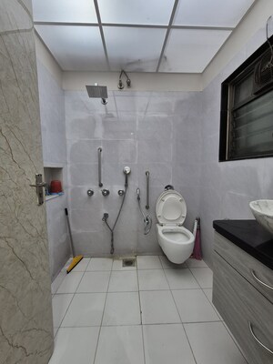 Bathroom in 3 BHK Apartment at Bredco New Viceroy Park , Kandivali East – for Sale