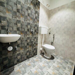 Bathroom in 1 BHK Apartment at Dynamic Crest, Shilphata – for Sale