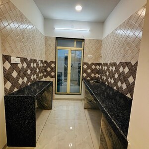 Kitchen in 1 BHK Apartment at Dynamic Crest, Shilphata – for Sale