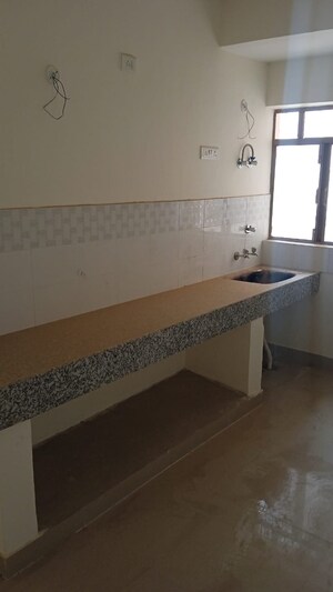 Kitchen in 2 BHK Apartment at Pareena Laxmi Apartments, Sector 99 – for Sale