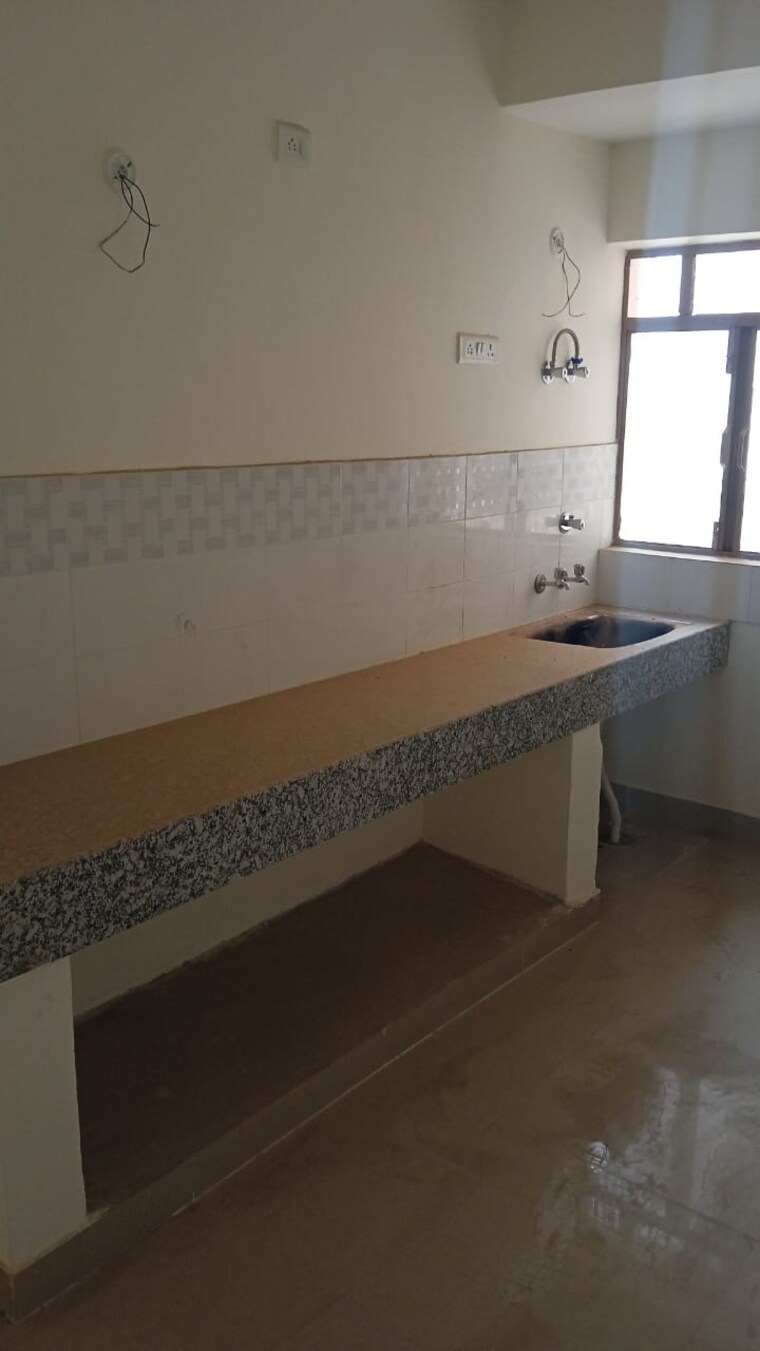 Kitchen, pareena-laxmi-apartments 2 Bedroom 550 Sq.Ft. Apartment In Sector 99 Gurgaon 9208197