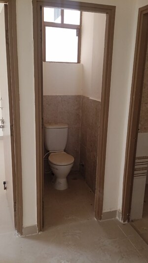 Bathroom in 2 BHK Apartment at Pareena Laxmi Apartments, Sector 99 – for Sale