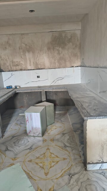 Kitchen in 4 BHK Builder Floor at Dlf Ankur Vihar – for Sale