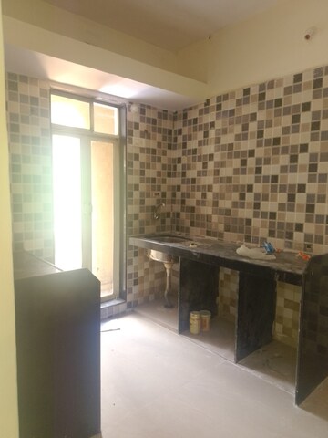 Kitchen in 1 BHK Apartment at MAAD Nakoda Heights, Nalasopara West – for Sale