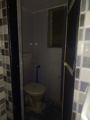 Bathroom in 1 BHK Apartment at MAAD Nakoda Heights, Nalasopara West – for Sale