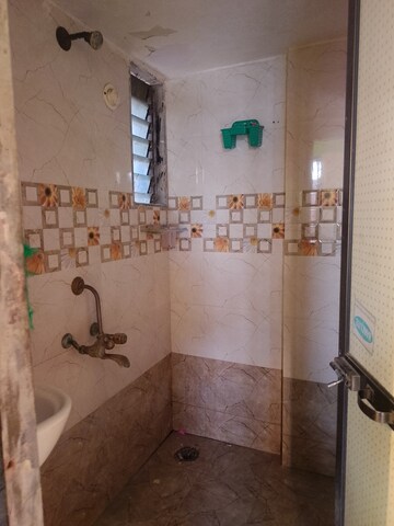 Bathroom in 1 BHK Apartment at Om Sai Heights Phase II, Morya Nagar – for Sale