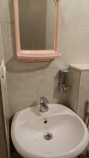 Bathroom in 2 BHK Apartment at Sheth Vasant Oasis, Andheri East – for Rent