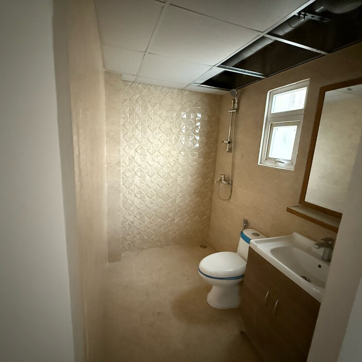 Bathroom, tulip-yellow 3 Bedroom 1034 Sq.Ft. Apartment In Sector 69 Gurgaon 9210596