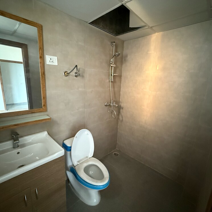 Bathroom, tulip-yellow 3 Bedroom 1034 Sq.Ft. Apartment In Sector 69 Gurgaon 9210596