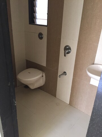Bathroom in 2 BHK Apartment at Om Shivam Arjun, Kamothe – for Rent