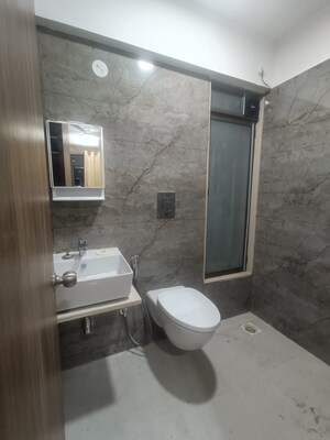 Bathroom in 1.5 BHK Apartment at Satellite Glory, Andheri East – for Rent