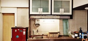 Kitchen in 3 BHK Apartment at Lakshmi Narayan Niwas, Dadar West – for Sale